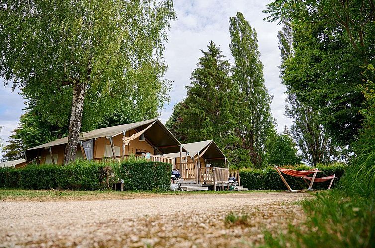 Discover the inviting outdoor space of tent house Wood in Les Abrets, Rhone-Alphes, France. Ideal for a unique glamping vacation.