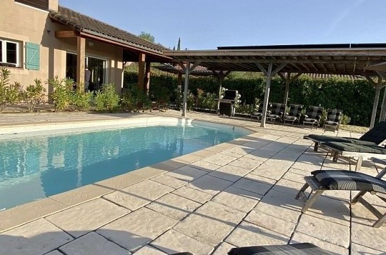 Relax by the pool at Le Sanglier, a charming vacation rental in Vallon-Pont-d'Arc, Rhone-Alphes, surrounded by nature.