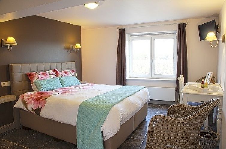 Comfortable bedroom in De Fruithoeve bed and breakfast, Tongeren, Limburg, Belgium.