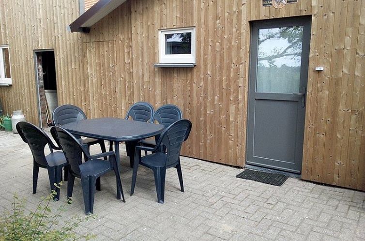 Cozy terrace at 't Akkers vacation home in Bocholt, Limburg, Belgium.