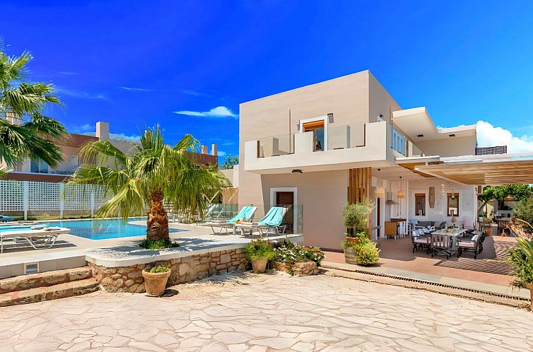 Vakantiehuis in Paralia Kourna mit Grill, Terrasse und Garte