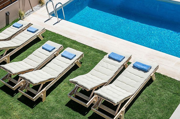 Vakantiehuis Ferienvilla "Fos" mit Blick auf das Wasser