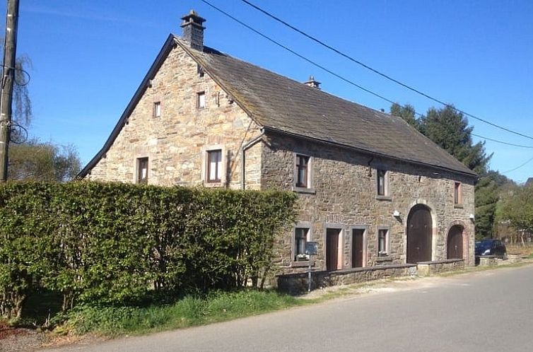 Vacation home in Waimes/Weismes, a charming stone house in the Ardennes, Liege, Belgium, surrounded by rustic nature and serene surroundings.