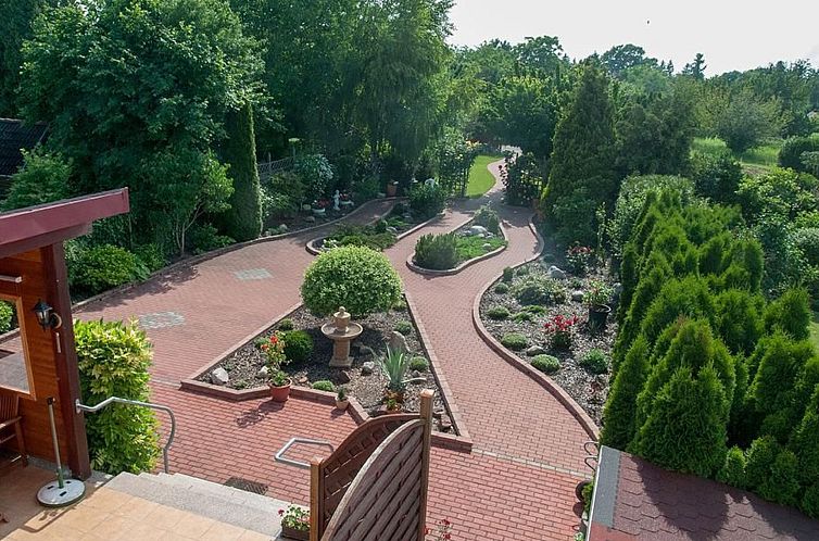 Vakantiehuis Wohnung mit Garten, Grill und Gemeinschaftspool