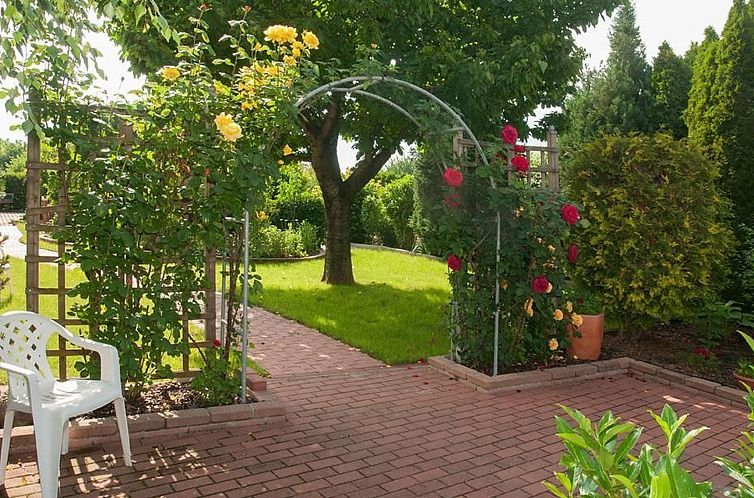 Vakantiehuis Wohnung mit Garten, Grill und Gemeinschaftspool