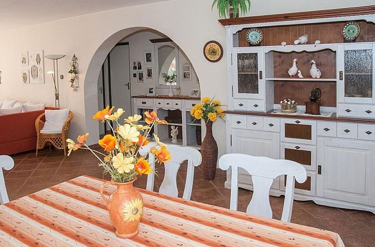 Vakantiehuis Wohnung mit Garten, Grill und Gemeinschaftspool