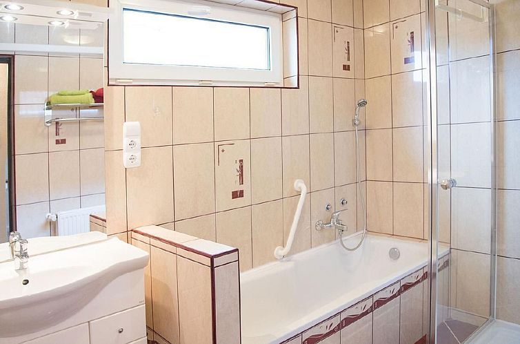 Vakantiehuis Wohnung mit Garten, Grill und Gemeinschaftspool
