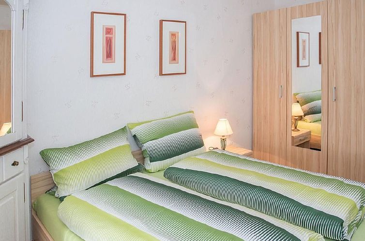 Vakantiehuis Wohnung mit Garten, Grill und Gemeinschaftspool