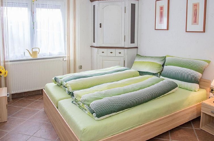 Vakantiehuis Wohnung mit Garten, Grill und Gemeinschaftspool