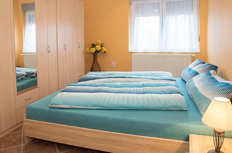 Vakantiehuis Wohnung mit Garten, Grill und Gemeinschaftspool
