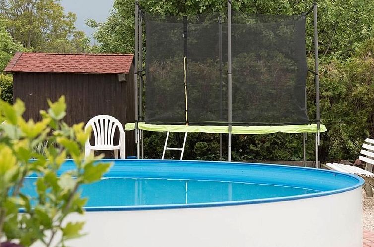 Vakantiehuis Wohnung mit Garten, Grill und Gemeinschaftspool