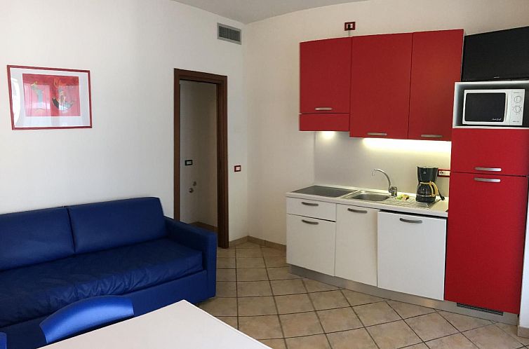 Guest house 0882117 - Apartment Emilia Romagna - Appartement in Lido Di Spina mit Möbliertem Balkon