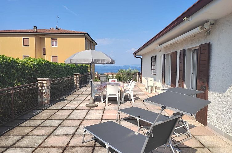 Vakantiehuis mit Seeblick und privatem Garten