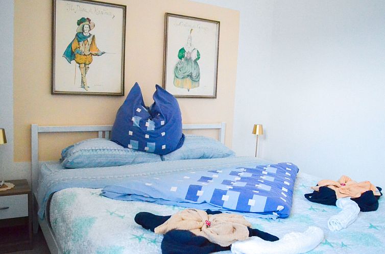 Appartement mit privatem Garten, Meerblick und Gemeinschafts