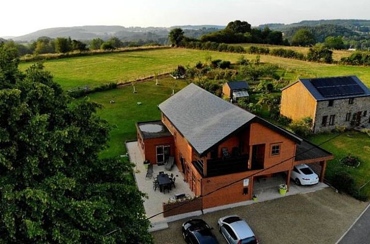 Aerial view of Holiday cottage in Rendeux with terrace and green area in Ardennes, Luxembourg, Belgium.