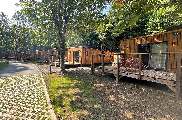 Ecolodge cottages with terrace surrounded by nature in Houffalize, Ardennes, Luxembourg, Belgium.