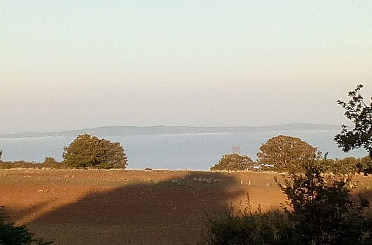 Appartement LaPorcilaia, Ferienwohnung mit Seeblick.