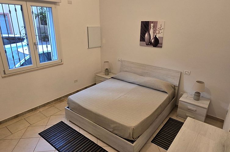 Appartement Miky's Home mit Patio und Veranda mit Innenhof