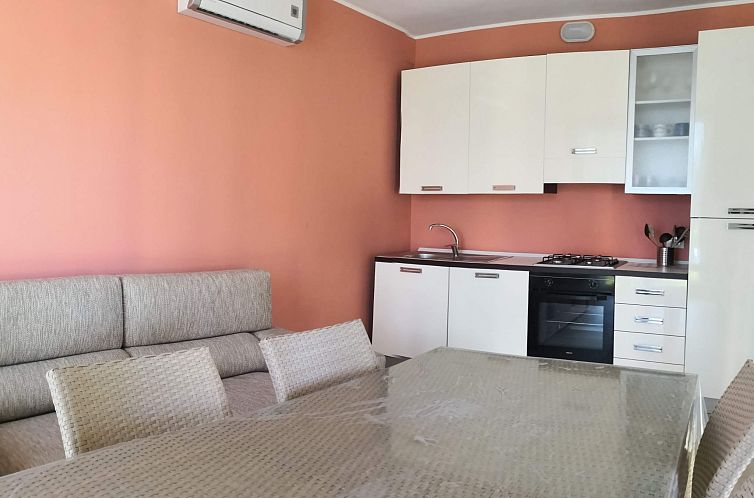 Vakantiehuis Villa carubedda porto pino exklusiv porto pino