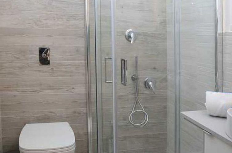 Appartement Edoné, Wohnung mit Blick auf einen Sandstrand