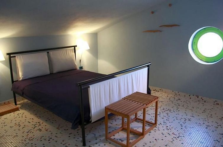 Appartement Studio mit Balkonblick ins bergige Grüne