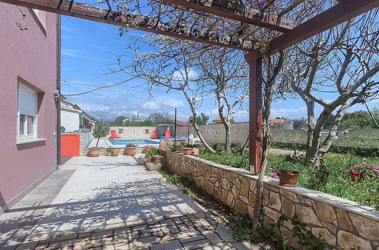 Appartement Wohnung in Fažana mit gemeinsamem Pool und Gart