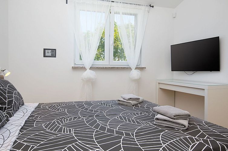 Vakantiehuis in Pomer mit Parkplatz