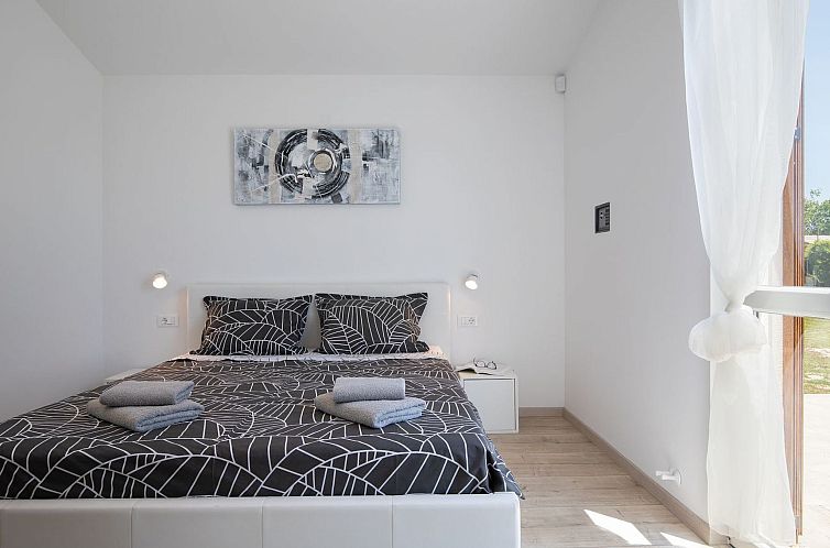 Vakantiehuis in Pomer mit Parkplatz
