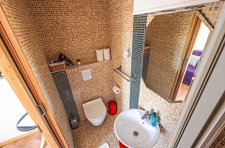 Appartement Nette Ferienwohnung in Pile mit Terrasse und Gar