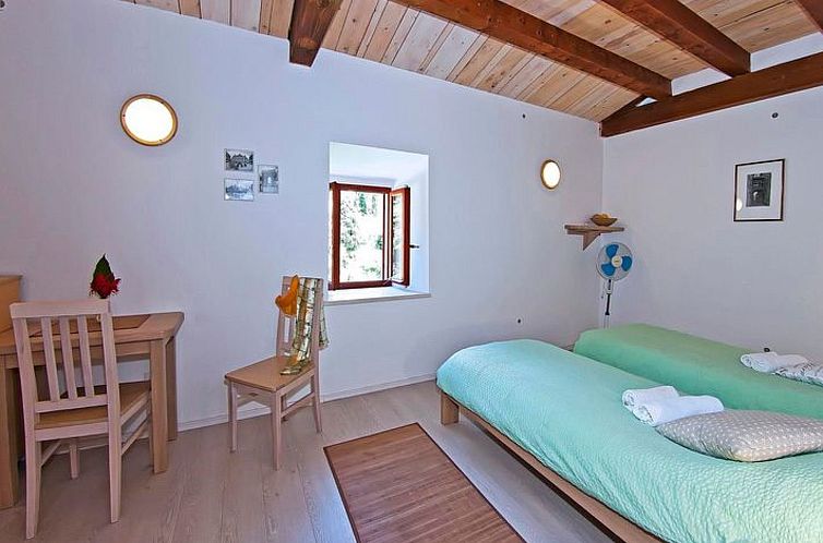 Vakantiehuis Privatzimmer im Schloss Seefront Zamagna, Mali 
