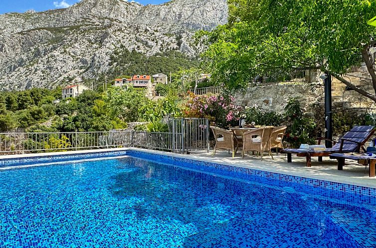 Vakantiehuis Charmantes Steinhaus mit Pool und Meerblick