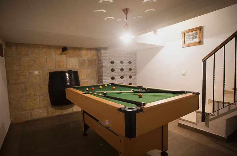 Vakantiehuis mit Privatpool neben dem Strand