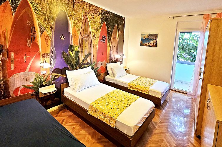 Appartement mit überdachter Terrasse und Balkon am Strand m