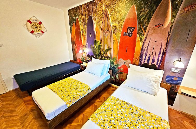 Appartement mit überdachter Terrasse und Balkon am Strand m