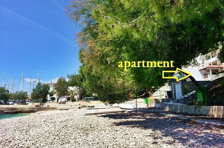 Appartement mit überdachter Terrasse und Balkon am Strand m
