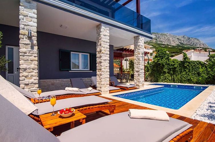 Vakantiehuis Haus in Stanići mit grünem Garten