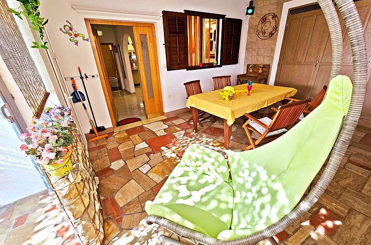 Appartement mit überdachter Terrasse am Strand mit Meerblic