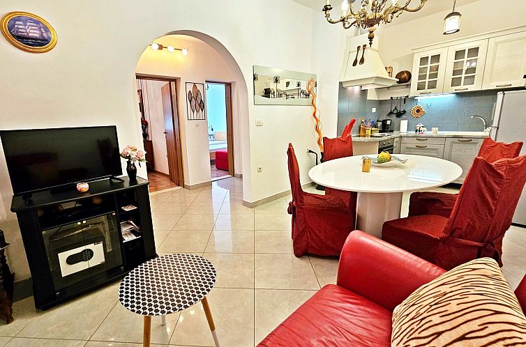 Appartement mit überdachter Terrasse am Strand mit Meerblic