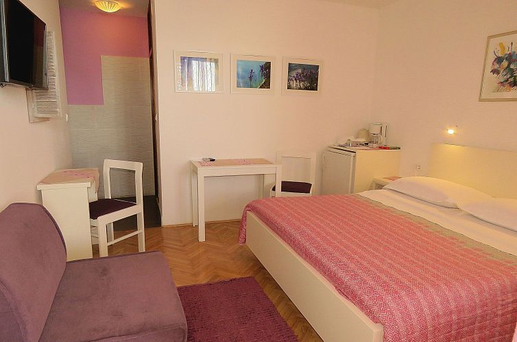 Vakantiehuis Ferien-Zimmer mit Terrasse