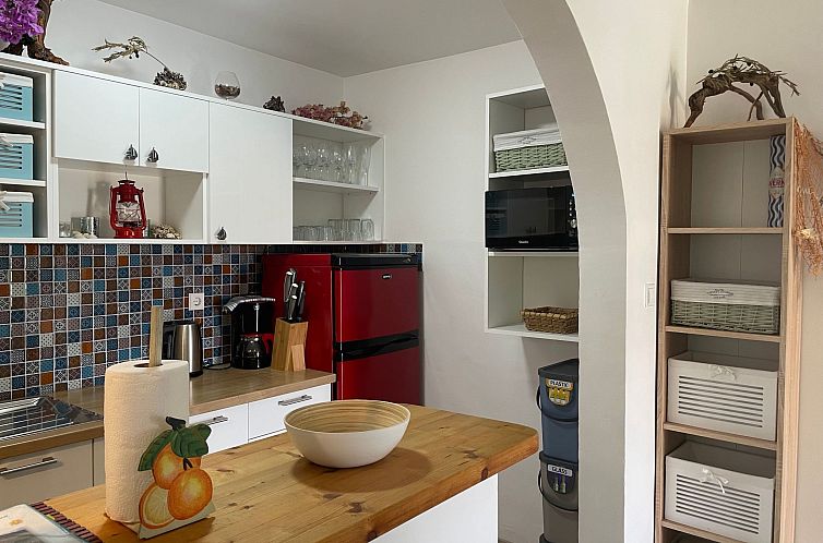 Appartement mit einer überdachten Terrasse