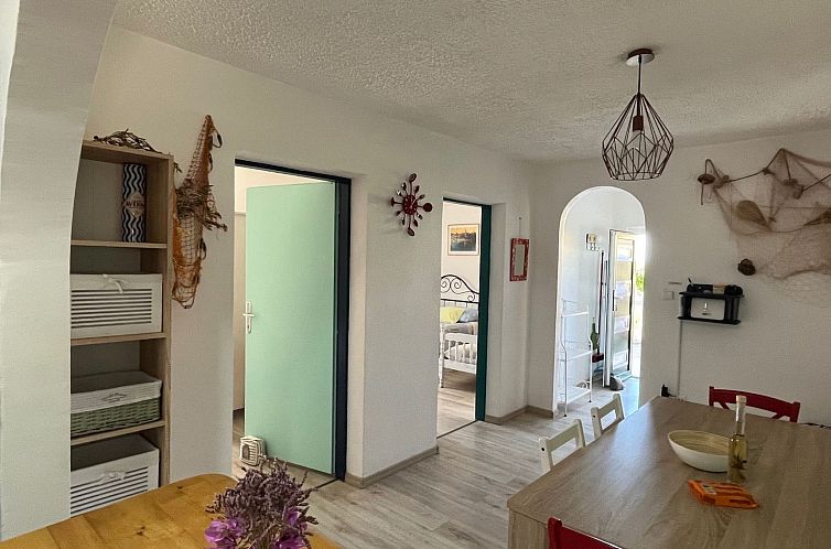 Appartement mit einer überdachten Terrasse