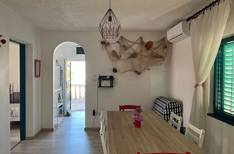 Appartement mit einer überdachten Terrasse
