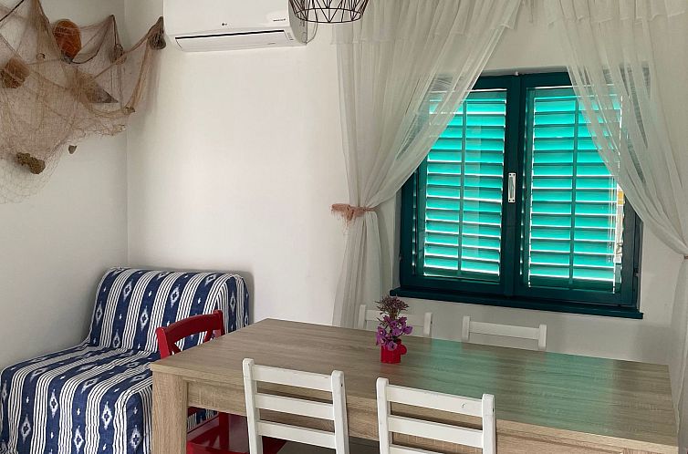 Appartement mit einer überdachten Terrasse