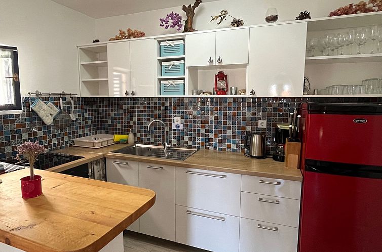 Appartement mit einer überdachten Terrasse