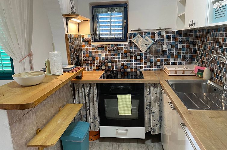 Appartement mit einer überdachten Terrasse