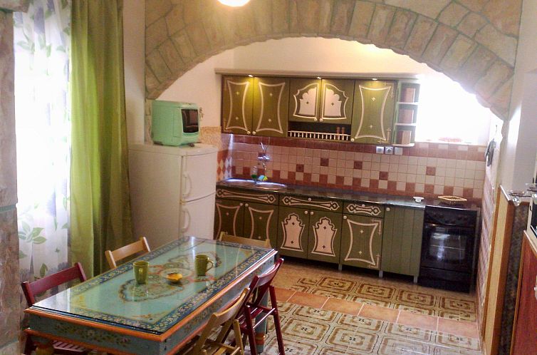 Appartement mit einer überdachten Terrasse