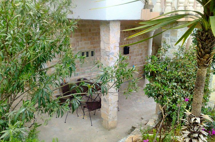 Appartement mit einer überdachten Terrasse