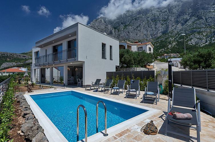 Vakantiehuis Moderne Villa Smart mit Pool und Meerblick