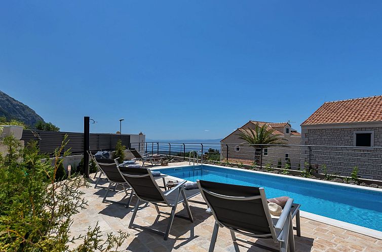 Vakantiehuis Moderne Villa Smart mit Pool und Meerblick