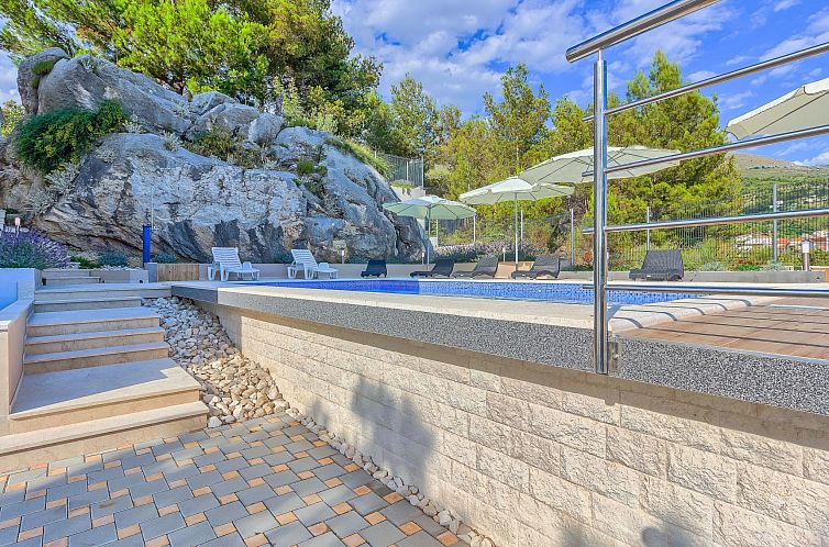 Vakantiehuis "Villa Rock" mit Blick auf das Wasser